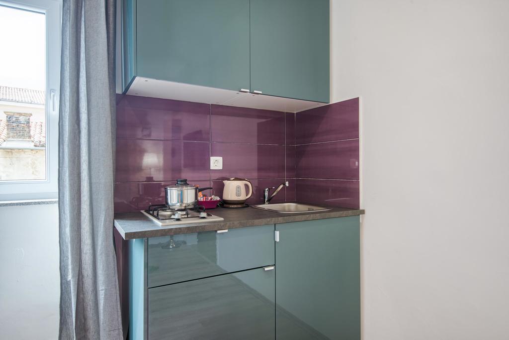 Top Center Rooms & Studio Penzión pre hostí 3*